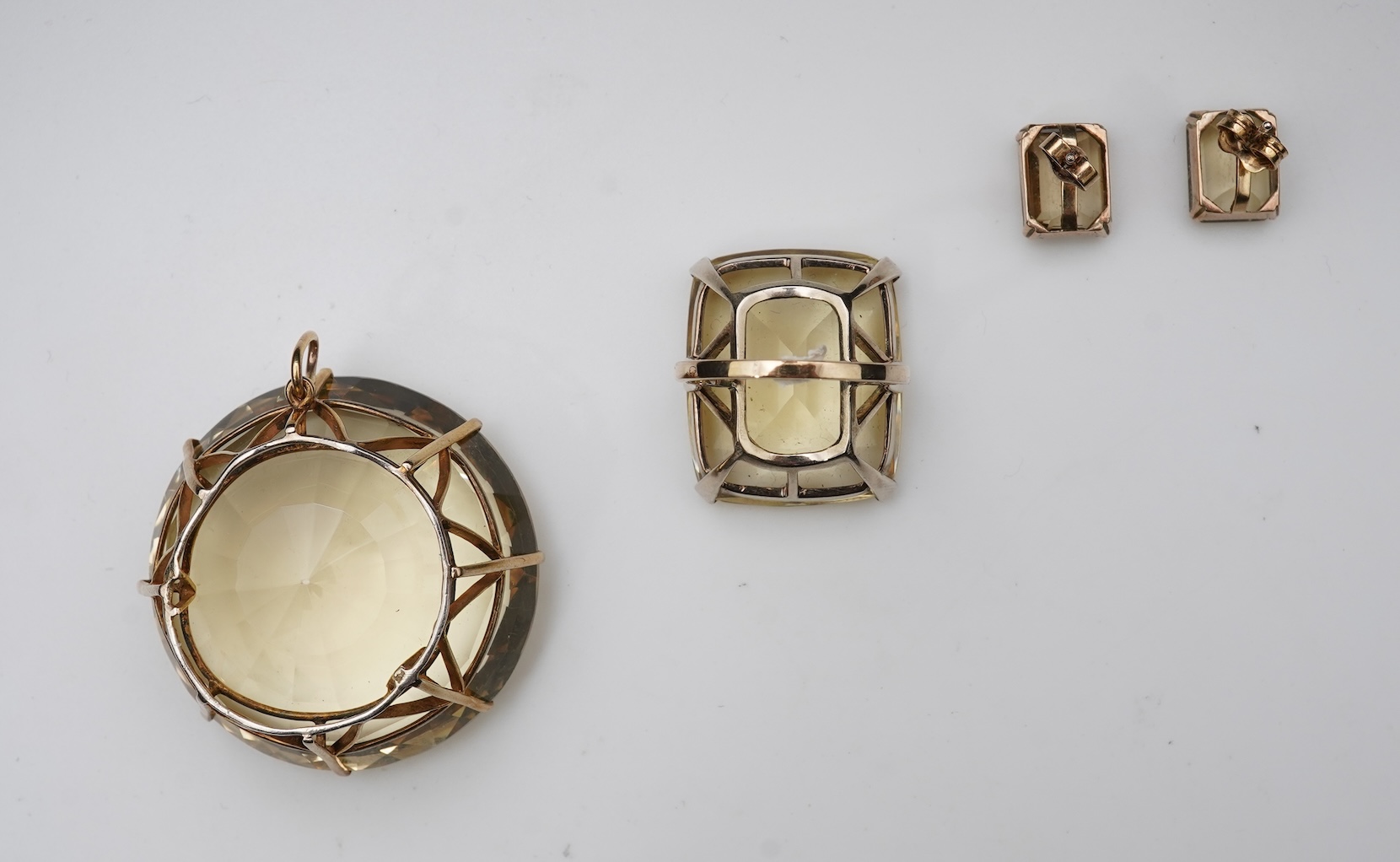 A collection of citrine jewels and a paste bracelet